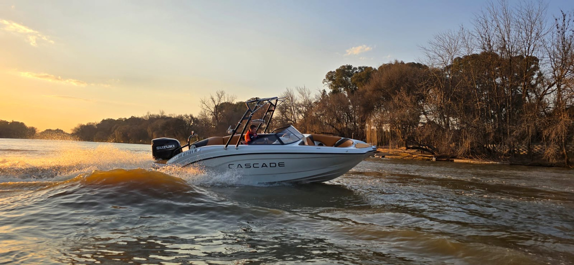 Cascade boat at sunset